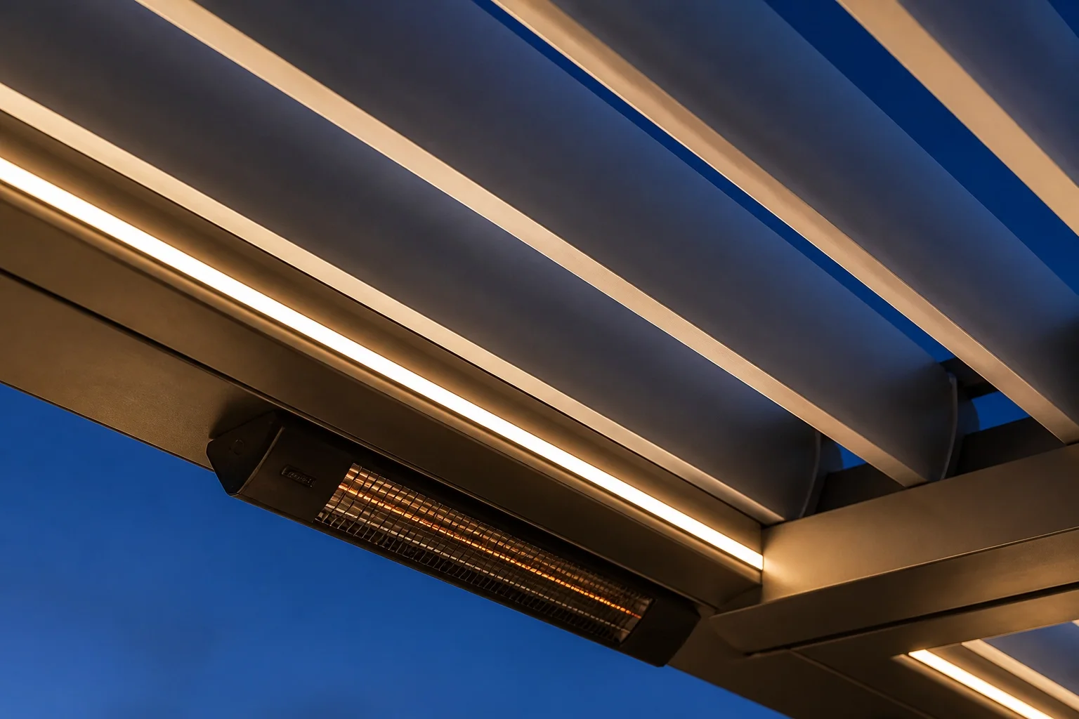 Bioklimatisches Lamellendach Wien mit LED-Beleuchtung und Infrarot-Heizstrahler.